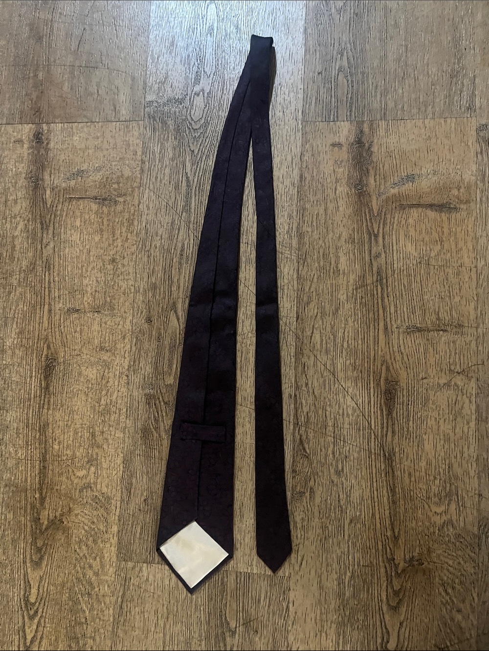 Dark red tie with flowers